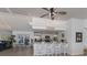 Bright, updated kitchen with stainless steel appliances and bar seating at 500 Halyard Ln, Longboat Key, FL 34228