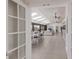 Bright and airy living space with skylights, tile floors, and water views at 500 Halyard Ln, Longboat Key, FL 34228