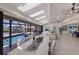 Elegant living room with skylights, opening to pool and waterway at 500 Halyard Ln, Longboat Key, FL 34228