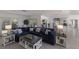 Comfortable living room area with large sectional sofa and inviting decor at 500 Halyard Ln, Longboat Key, FL 34228