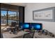 Home office with waterfront views, dual monitors, and ample workspace for productivity at 500 Halyard Ln, Longboat Key, FL 34228