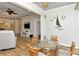 Open living room with an adjacent lanai and view of TV and furnishings at 5223 Chase Oaks Dr, Sarasota, FL 34241
