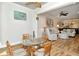 Open living room with an adjacent lanai and view of TV and furnishings at 5223 Chase Oaks Dr, Sarasota, FL 34241