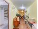 Basement with storage and utilities, featuring tiled floors and organized spaces for practical home management at 5311 San Jose Dr, Sarasota, FL 34235
