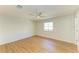 Bright bedroom with ceiling fan, light walls, and wood-look flooring offers a comfortable and airy retreat at 5311 San Jose Dr, Sarasota, FL 34235