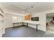 A well-lit garage with built-in shelving, work surfaces, and ample storage space at 5311 San Jose Dr, Sarasota, FL 34235
