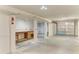 Spacious garage featuring a workbench area, storage, and an overhead garage door at 5311 San Jose Dr, Sarasota, FL 34235