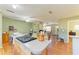Open kitchen flows into the living and dining areas, enhancing the home's spacious, interconnected layout at 5311 San Jose Dr, Sarasota, FL 34235