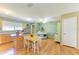 Large eat-in kitchen with wood cabinets, an island cooktop, and lots of light at 5311 San Jose Dr, Sarasota, FL 34235