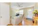 Cozy living room with hardwood floors, ceiling fan, and lots of natural light at 5311 San Jose Dr, Sarasota, FL 34235
