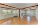 Bright living space with modern decor, wood floors, and an open layout to the kitchen at 5311 San Jose Dr, Sarasota, FL 34235