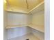A small storage area with installed shelving that is ready for organizing household goods at 5311 San Jose Dr, Sarasota, FL 34235