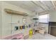 Storage room featuring shelving and a variety of storage items, providing ample space for organizing household goods at 5311 San Jose Dr, Sarasota, FL 34235