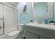 Bathroom showcasing a shower-tub combination and a contemporary gray vanity at 6263 Midnight Pass Rd # 301, Sarasota, FL 34242