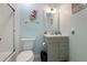 A modern bathroom with a shower and tub combo and a gray vanity at 6263 Midnight Pass Rd # 301, Sarasota, FL 34242