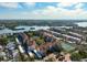Scenic view of a waterfront community with multiple buildings and lush landscaping at 6263 Midnight Pass Rd # 301, Sarasota, FL 34242