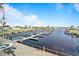 Aerial view of community marina with docks, boats, and waterfront views at 709 Riverview Cir, North Port, FL 34287