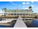 Waterfront club house showcasing a shared dock and easy access to the water at 709 Riverview Cir, North Port, FL 34287