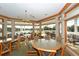 Inviting clubhouse dining area with scenic views and comfortable seating arrangements at 7609 Sweetbay Cir # 7609, Bradenton, FL 34203