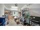 Organized garage with shelving units providing ample storage space for tools, boxes, and equipment at 7609 Sweetbay Cir # 7609, Bradenton, FL 34203