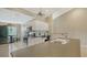 Well-equipped kitchen with modern appliances, ample countertop space, and adjacent breakfast nook at 7609 Sweetbay Cir # 7609, Bradenton, FL 34203