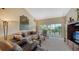 Inviting living room with stylish furniture and bright light from windows at 7609 Sweetbay Cir # 7609, Bradenton, FL 34203