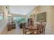 Spacious living room boasts high ceilings, ample natural light, and stylish decor at 7609 Sweetbay Cir # 7609, Bradenton, FL 34203