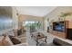 Comfortable living space with balcony access, perfect for relaxing or entertaining at 7609 Sweetbay Cir # 7609, Bradenton, FL 34203