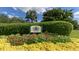 Community sign, 'The Preserve At Tara', surrounded by vibrant flower beds and lush greenery at 7609 Sweetbay Cir # 7609, Bradenton, FL 34203