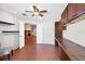 Office space with fireplace and cabinets for storage, seamlessly blending functionality and style at 8036 Conservatory Cir, Sarasota, FL 34243