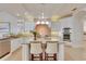 Spacious kitchen with a center island, granite countertops, and stainless steel appliances at 805 3Rd E St, Palmetto, FL 34221