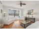 Cozy living room featuring a waterfront view from a large window seat at 805 3Rd E St, Palmetto, FL 34221