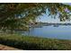 Scenic waterfront view featuring docks and boats nestled among lush greenery at 805 3Rd E St, Palmetto, FL 34221