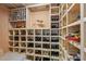 Well-stocked wine cellar with wooden racks and storage for an extensive collection at 805 3Rd E St, Palmetto, FL 34221