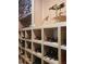 Close-up of organized wine cellar showcasing neatly arranged bottles and shelving at 805 3Rd E St, Palmetto, FL 34221
