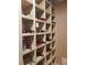 Wine cellar with organized wooden shelves displaying an impressive wine collection at 805 3Rd E St, Palmetto, FL 34221