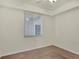 Cozy bedroom with a ceiling fan and a window view of the outdoors at 920 Tidewater Shores Loop # 304, Bradenton, FL 34208