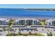 Charming waterfront condos with covered parking, palm trees, and water views at 920 Tidewater Shores Loop # 304, Bradenton, FL 34208