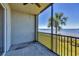 Scenic screened lanai with views of lush greenery and the calming water at 920 Tidewater Shores Loop # 304, Bradenton, FL 34208