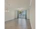 Open concept living space with great water views and tile flooring at 920 Tidewater Shores Loop # 304, Bradenton, FL 34208