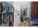 A large walk-in closet with plenty of hanging and storage space at 9902 284Th St E E St, Myakka City, FL 34251