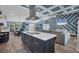 Open concept kitchen with island cooktop, seamless access to dining and living spaces, great for entertaining at 9902 284Th St E E St, Myakka City, FL 34251