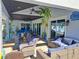 Covered patio featuring outdoor seating and decor with seamless indoor-outdoor flow at 9902 284Th St E E St, Myakka City, FL 34251