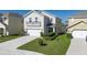 Aerial view of the home highlighting landscaping, and large manicured lot at 108 San Avellino Ct, Bradenton, FL 34208