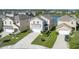 Aerial view of neighborhood highlighting ponds and manicured lawns at 108 San Avellino Ct, Bradenton, FL 34208