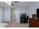 Spacious bedroom includes ample closet space, a ceiling fan, and neutral walls at 108 San Avellino Ct, Bradenton, FL 34208