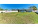 Well-maintained backyard featuring a white fence and partial view of the house at 1112 67Th Nw St, Bradenton, FL 34209