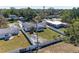 Spacious backyard featuring a well-maintained lawn and secure white fence, offering ample space for outdoor activities at 1112 67Th Nw St, Bradenton, FL 34209