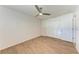 Bedroom with closet, ceiling fan and wood-look floors at 1112 67Th Nw St, Bradenton, FL 34209