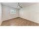 Bedroom features wood-look floors and a ceiling fan at 1112 67Th Nw St, Bradenton, FL 34209